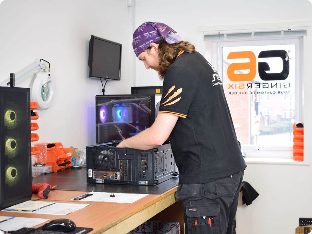 Ginger6 PC builder assembling a custom gaming PC in the Wolverhampton workshop