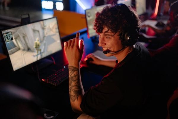 Competitive gamer at their PC