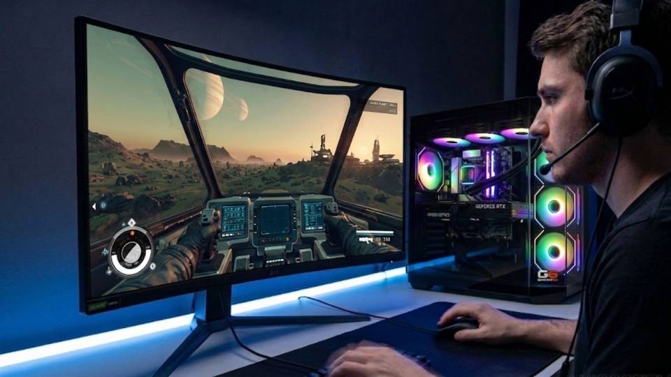 Ginger6 gaming PC in a Starfield desk setup with 1440p monitor showing planetary surface