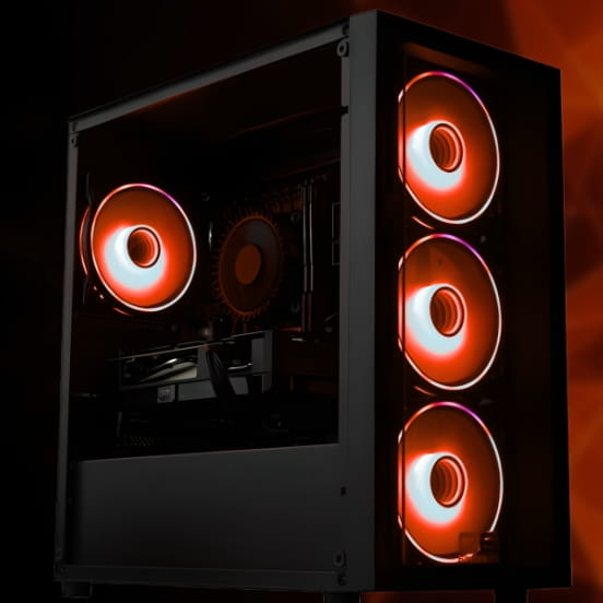 AMD-powered gaming PC setup with RGB lighting, a curved 4K monitor showing a high-action game, and a Ryzen processor visible through a tempered glass panel
